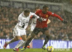 Tottenham and Manchester United tie 1 on a snowy London