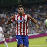 Atletico Madrid’s Diego Costa celebrates his goal during their Spanish first division soccer match against Real Madrid at Santiago Bernabeu stadium in Madrid